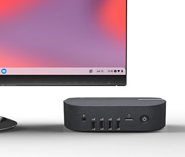 Mini PC s mnoha I/O porty vedle monitoru