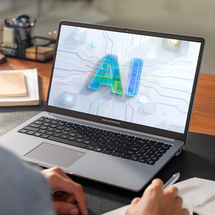 a side view of ExpertBook AI laptop placing on the work desk at home.