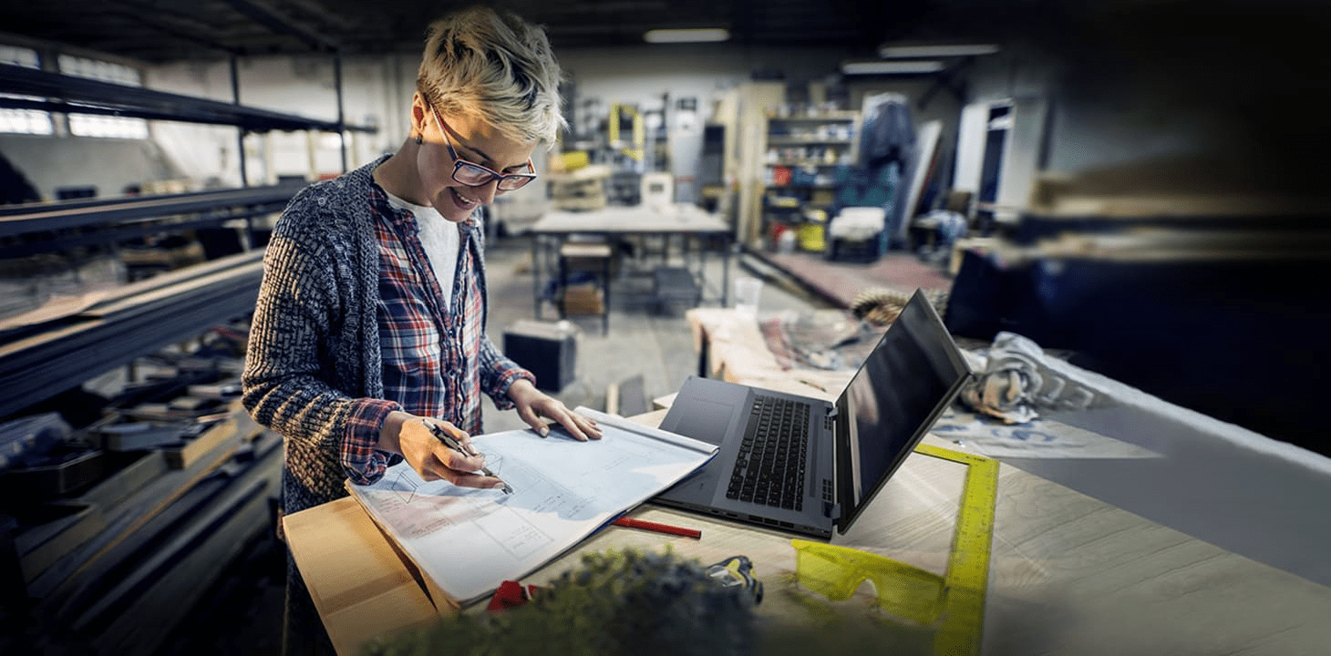 A businessman is working attentively by ASUS Chromebook CX9.