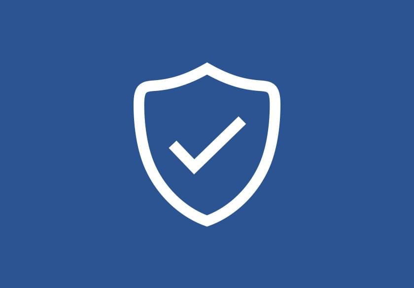 White shield icon with a checkmark inside on a blue circular background