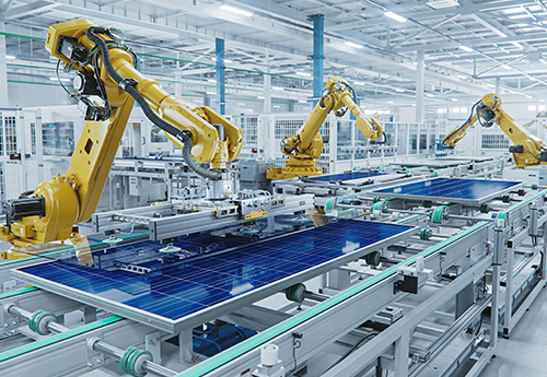Factory production line with robotic arms working