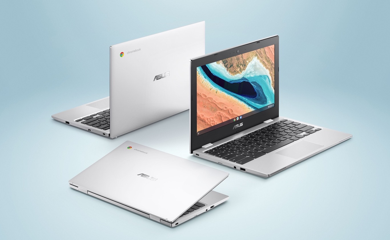 Three ASUS Chromebook CX1101, two 90 degrees opened and one slightly opened