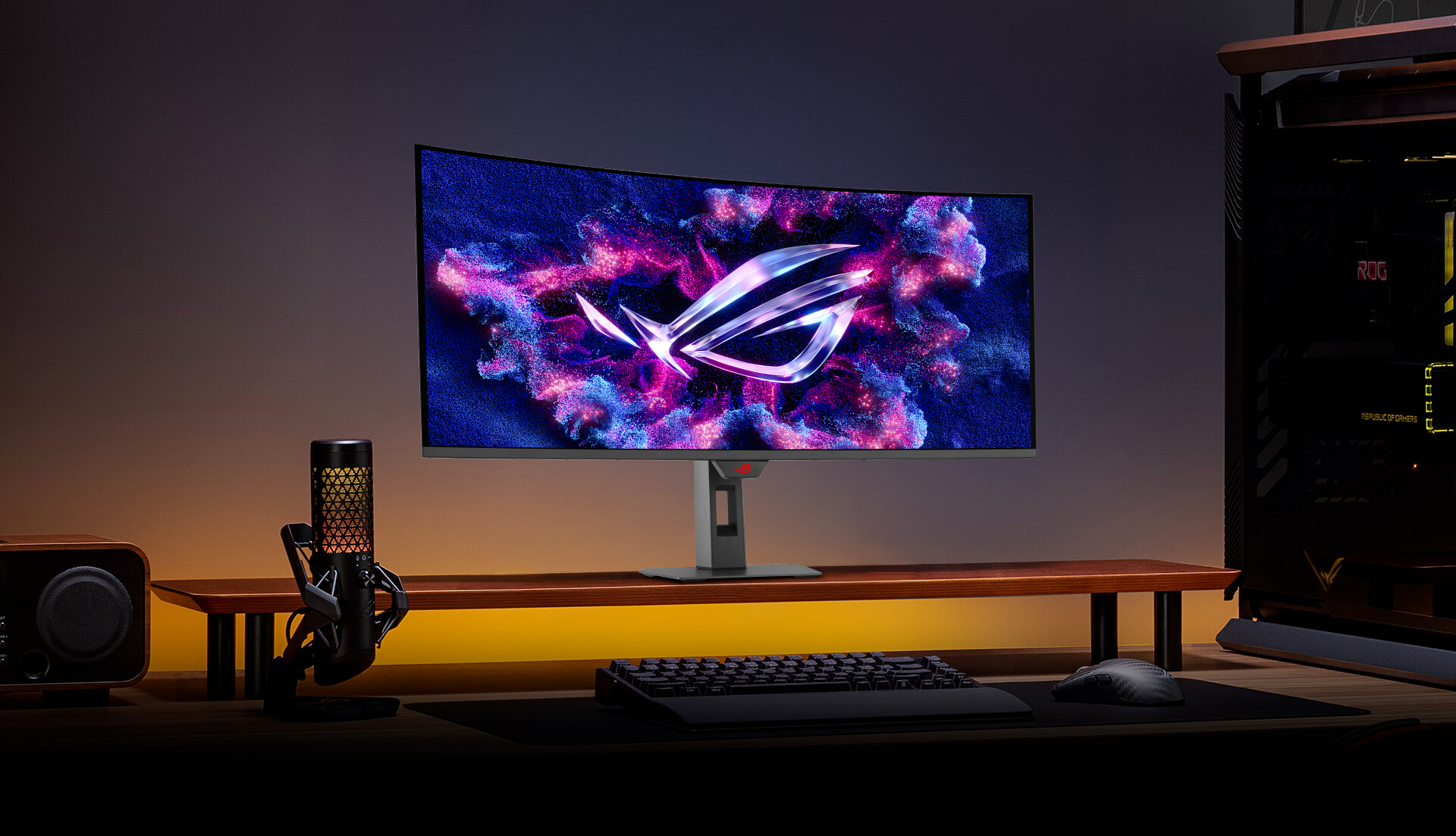 G27UCDM monitor on a screen stand with a mic in the foreground
