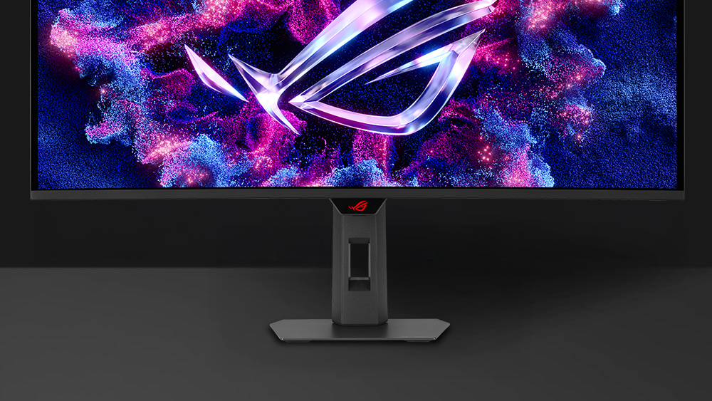 The front image of XG34WCDG with a mobile phone on device groove
