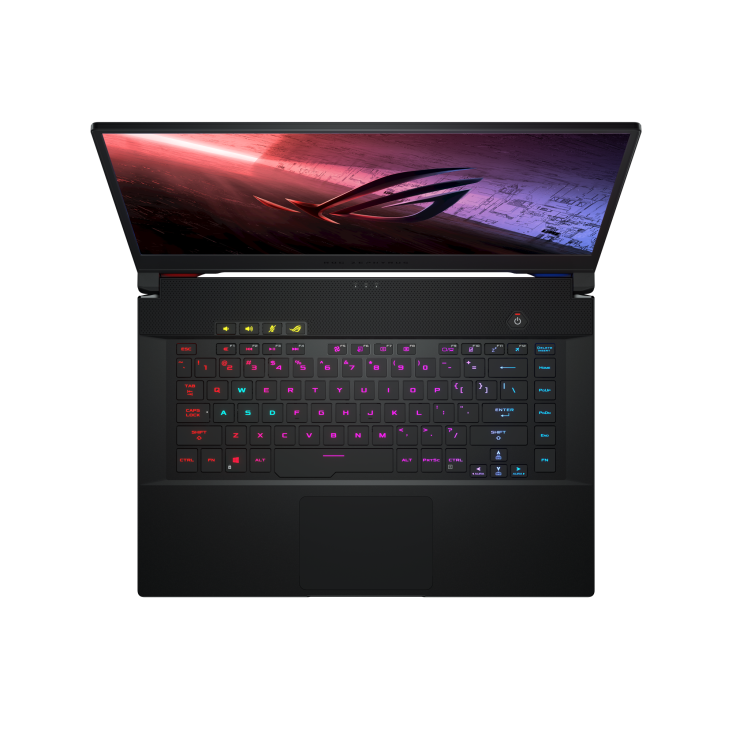Top down view of a Zephyrus S15 with the ROG logo on screen and keyboard illuminated.