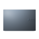 Blue Vivobook Pro 15 OLED (K6502) is closed and placed on the front with the ASUS label.