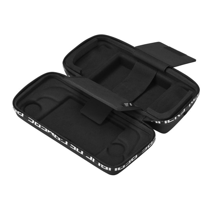 An open, black zippered case with a soft interior and empty compartments on a dark background