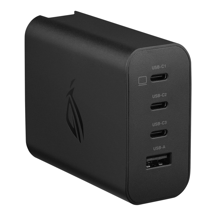 A black USB charger showing one USB-A and three USB-C ports with the ROG logo on the side