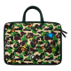 The side view of green camo carry bag.