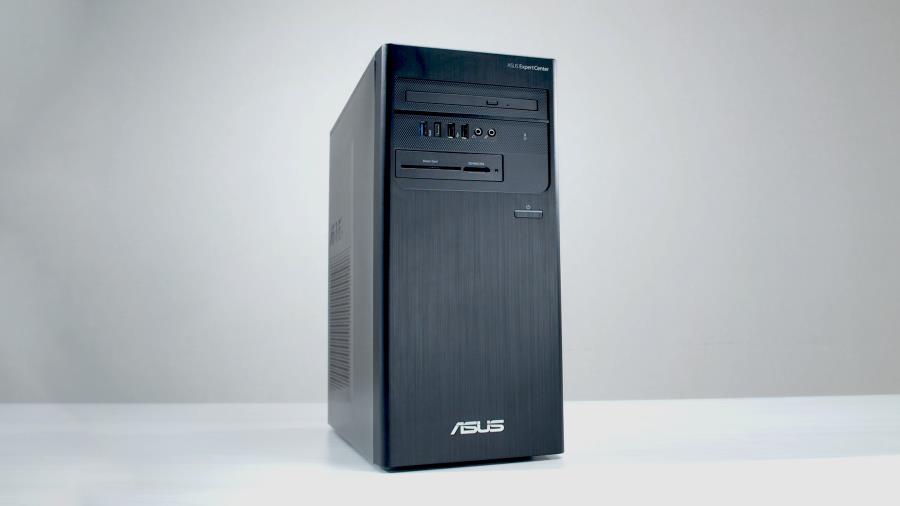 An ExpertCenter tower PC on the desk.
