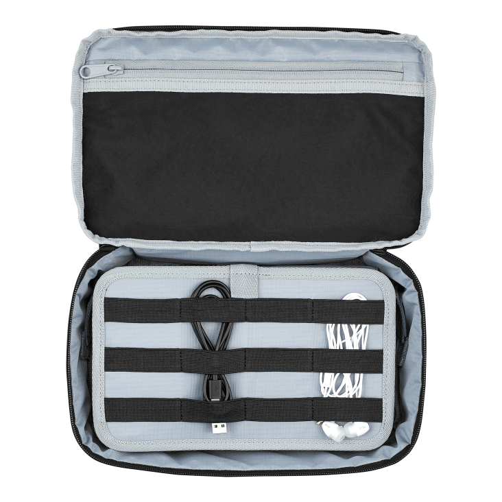 Open view of the ROG Archer ErgoAir Gaming Backpack tech pouch with cables strapped inside