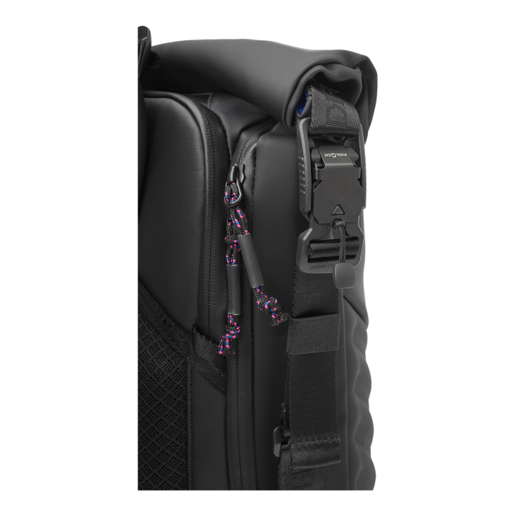 Close-up of black backpack's zipper and buckle
