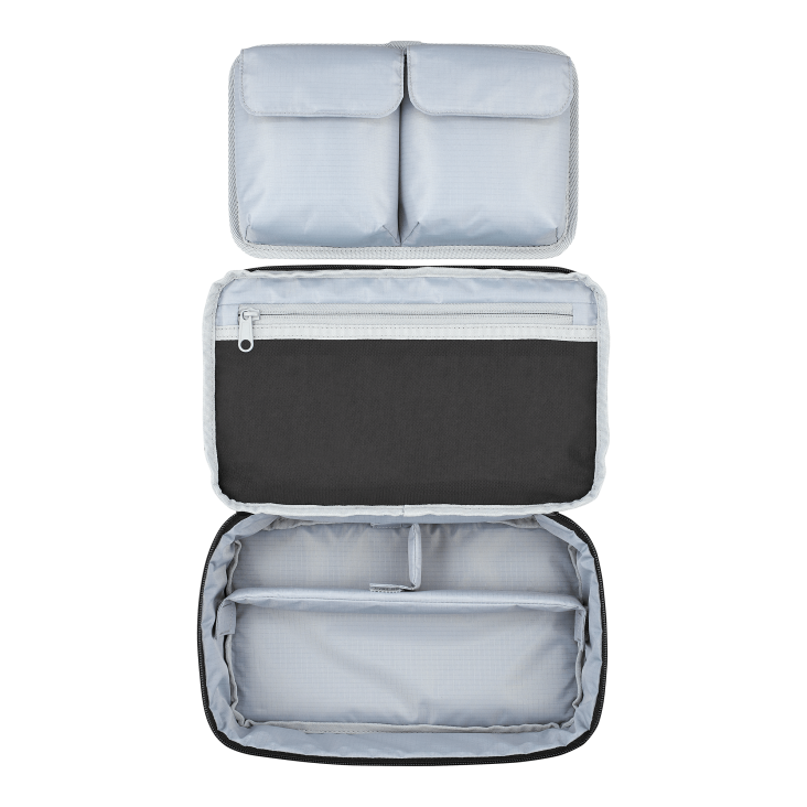 Interior view of ROG Archer ErgoAir Gaming Backpack's tech pouch compartments