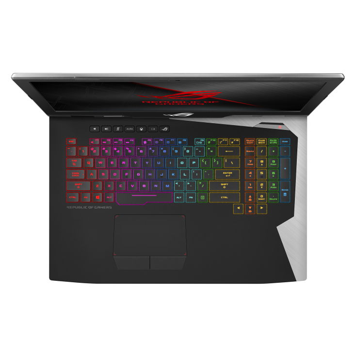 Top down view of the ROG G703, with the lid open and the ROG "Fearless Eye" logo on screen, with the keyboard illuminated in RGB lighting.