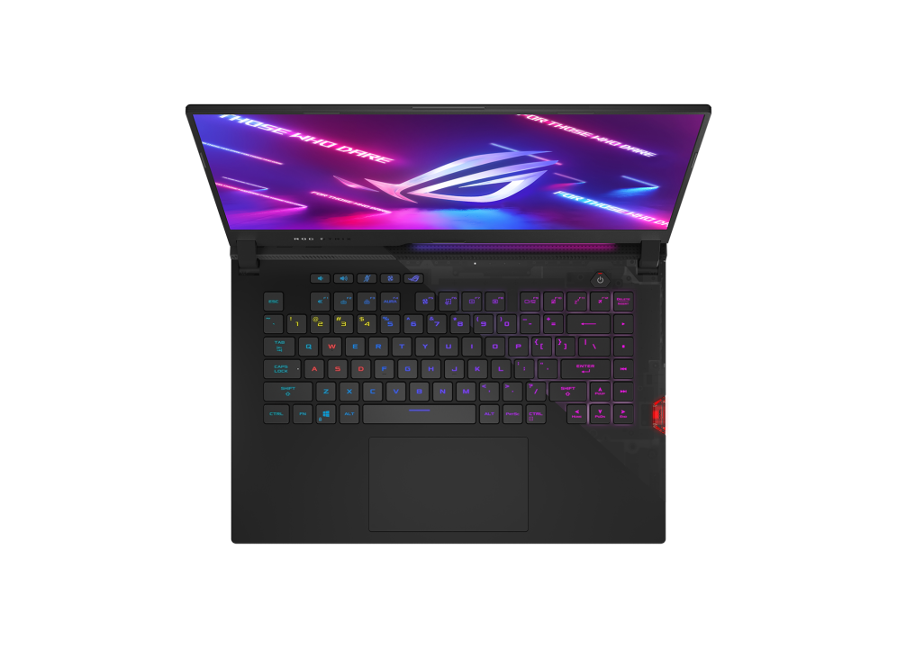 Front view of the ROG Strix SCAR 15, with the NumberPad and keyboard illuminated and ROG logo on screen.
