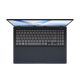 ASUS Vivobook 16 opened at 90-degree view from above, with backlit keyboard.
